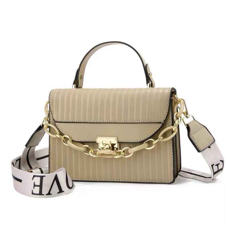 Black Striped Shoulder Bag with Gold Chain & "LOV" Strap