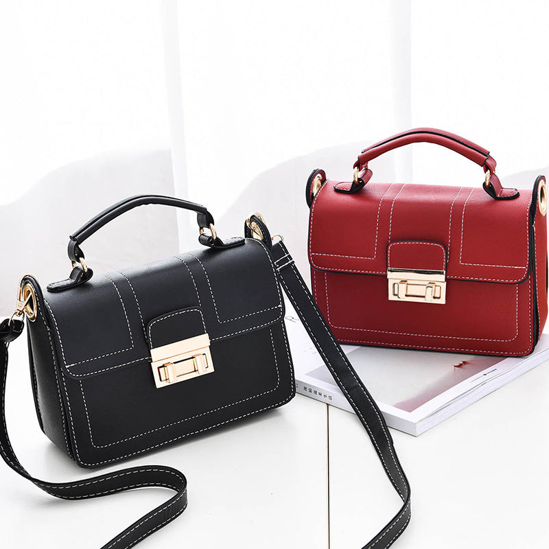 Women's Black Crossbody Bag with Gold Hardware