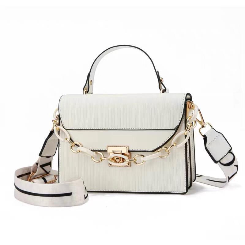 Black Striped Shoulder Bag with Gold Chain & "LOV" Strap