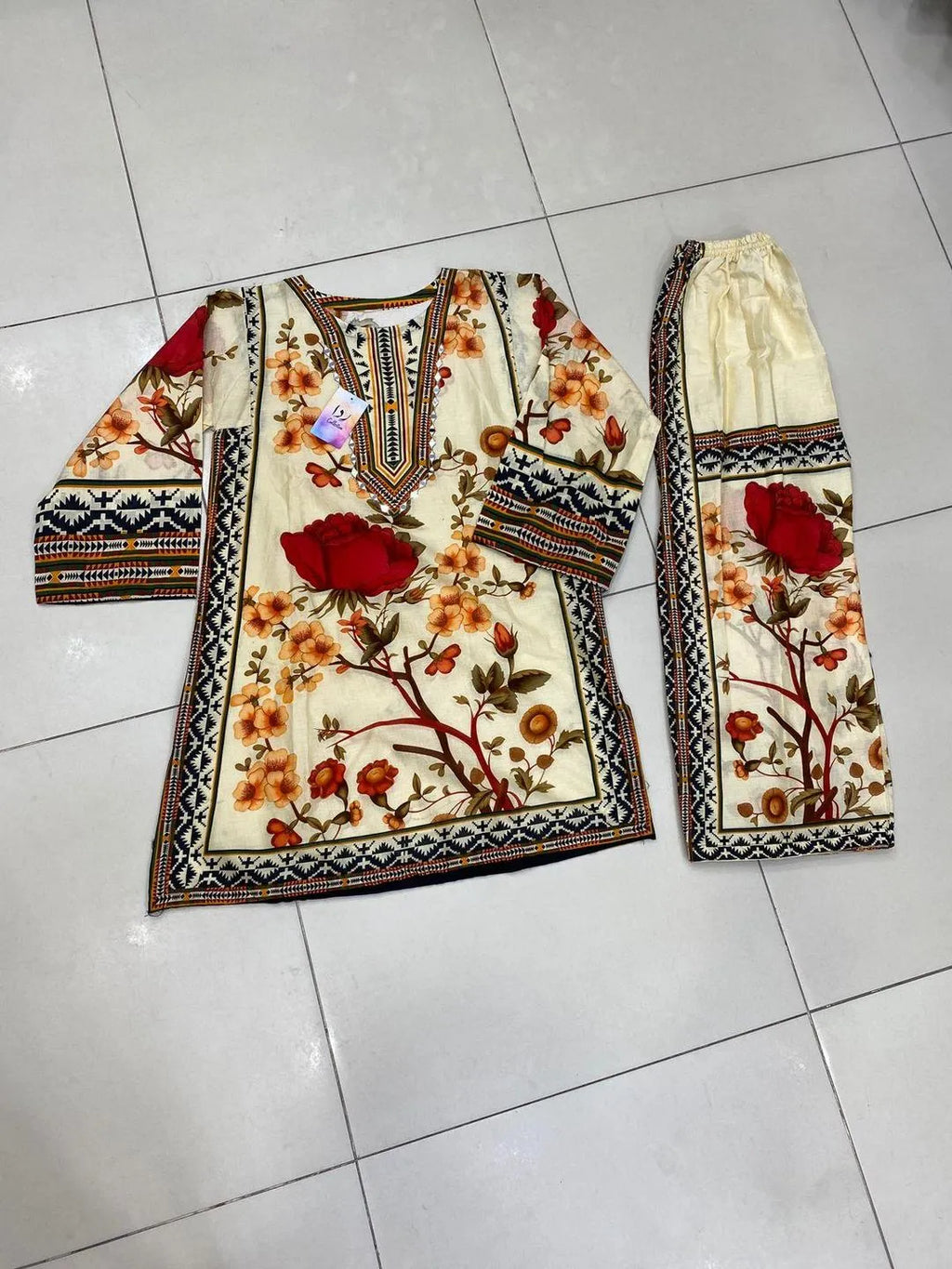 Pakistani Printed Kurta Pajama Set with Embroidered Details