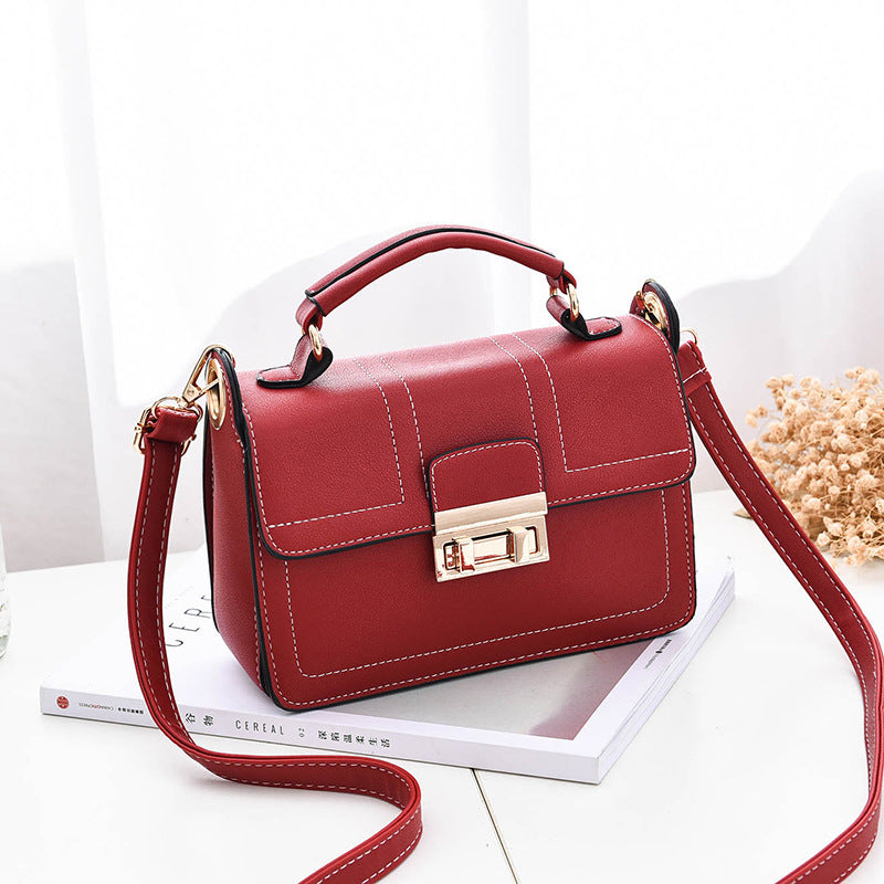 Women's Black Crossbody Bag with Gold Hardware